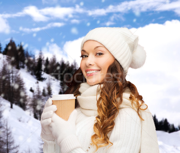 woman in hat with takeaway tea or coffee cup Stock photo © dolgachov