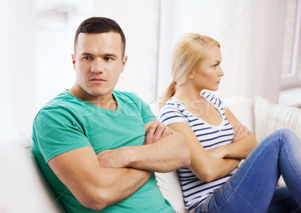 unhappy couple having argument at home Stock photo © dolgachov