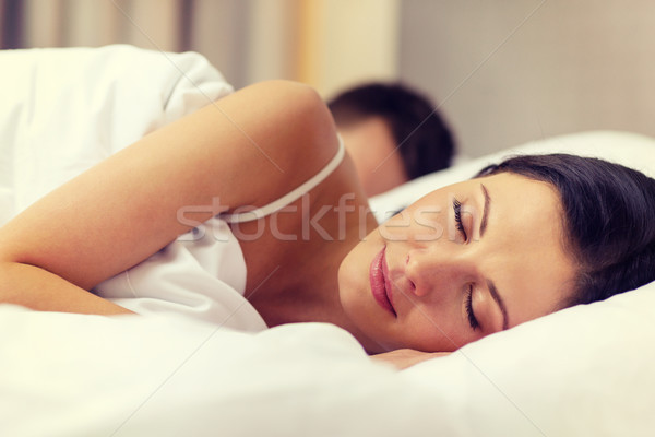 Stockfoto: Gelukkig · paar · slapen · bed · hotel · reizen