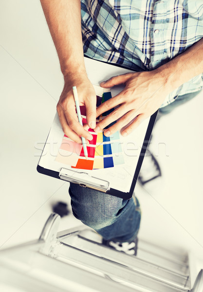 Stock photo: man with color samples for selection