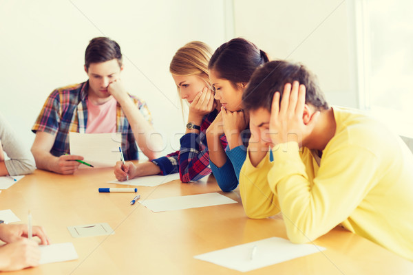 group of students with papers Stock photo © dolgachov