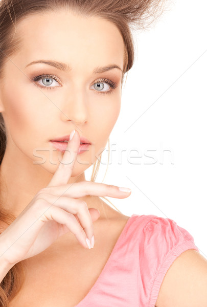 finger on lips Stock photo © dolgachov