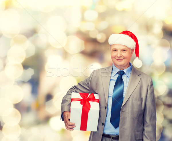 微笑 男子 訴訟 聖誕老人 幫手 帽子 商業照片 © dolgachov