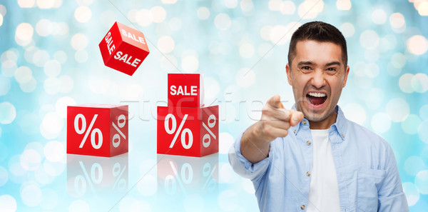 angry man shouting and pointing finger on you Stock photo © dolgachov