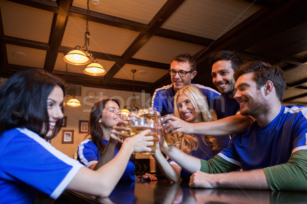 Fútbol aficionados cerveza gafas deporte bar Foto stock © dolgachov