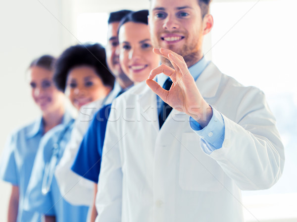 close up of doctors showing ok sign at hospital Stock photo © dolgachov