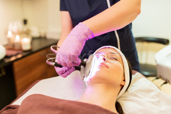 young woman having face microdermabrasion at spa Stock photo © dolgachov