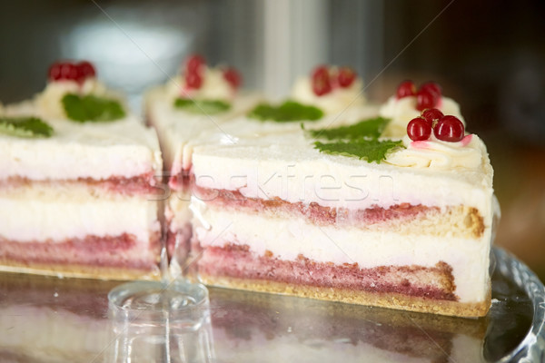 pieces of cake on stand Stock photo © dolgachov