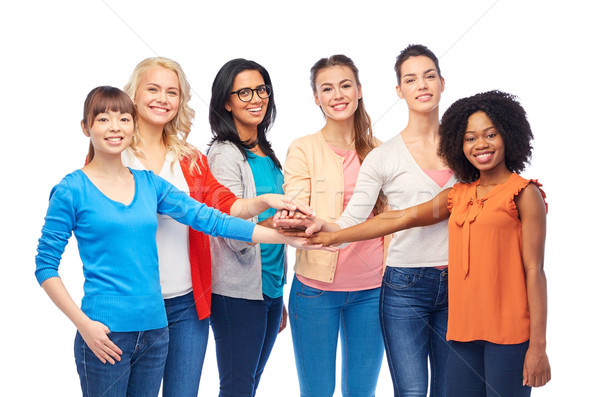 Internationale groep vrouwen handen samen diversiteit Stockfoto © dolgachov