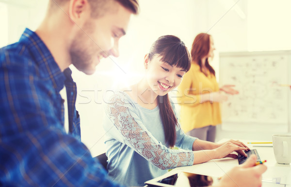 creative team with tablet pc computer at office Stock photo © dolgachov