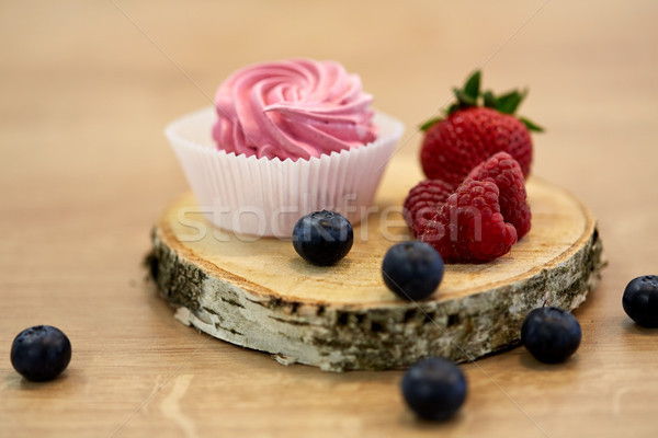 zephyr or marshmallow with berries on stand Stock photo © dolgachov