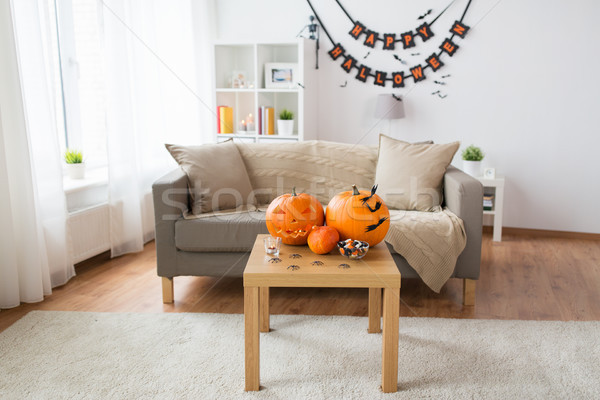 jack-o-lantern and halloween decorations at home Stock photo © dolgachov
