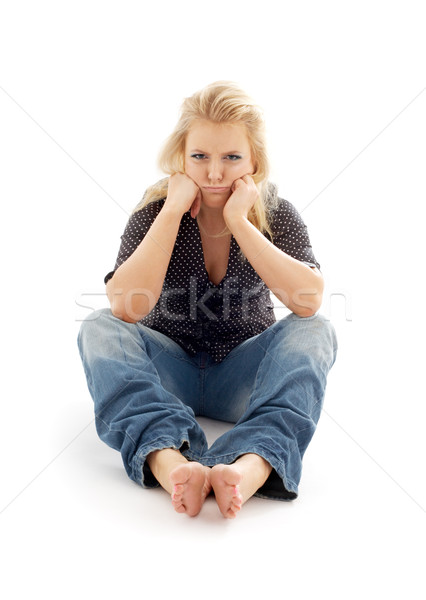 offended girl sitting on the floor Stock photo © dolgachov