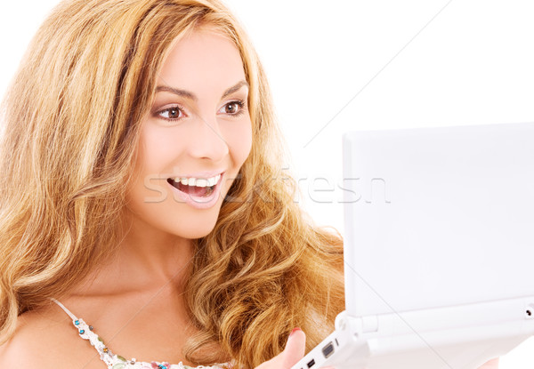 Stock photo: happy woman with laptop computer