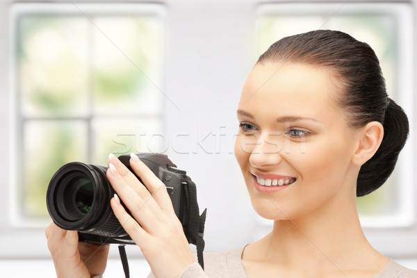 teenage girl with digital camera Stock photo © dolgachov