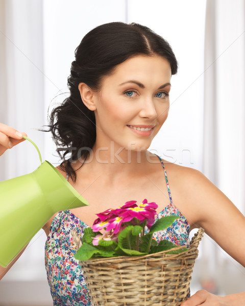 домохозяйка цветок корзины лейка женщину девушки Сток-фото © dolgachov