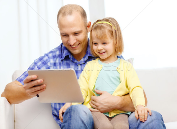 happy father and daughter with tablet pc computer Stock photo © dolgachov