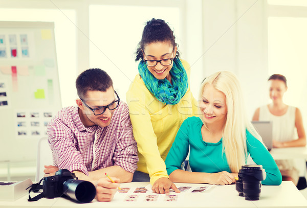 Souriant équipe imprimé Photos travail bureau [[stock_photo]] © dolgachov