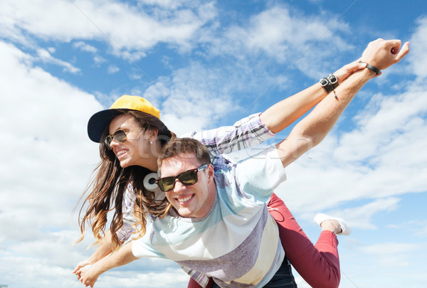 teenagers having fun outside Stock photo © dolgachov