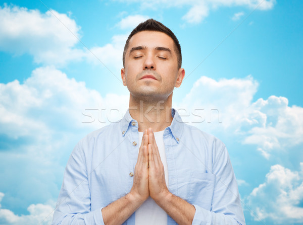 happy man praying Stock photo © dolgachov