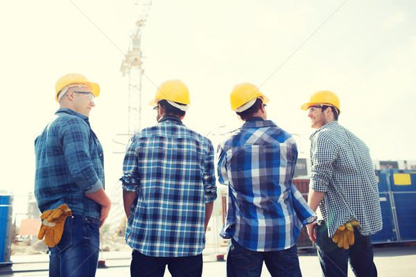 Foto stock: Grupo · sorridente · construtores · ao · ar · livre · negócio · edifício