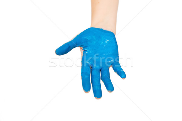 human hand painted with blue color Stock photo © dolgachov