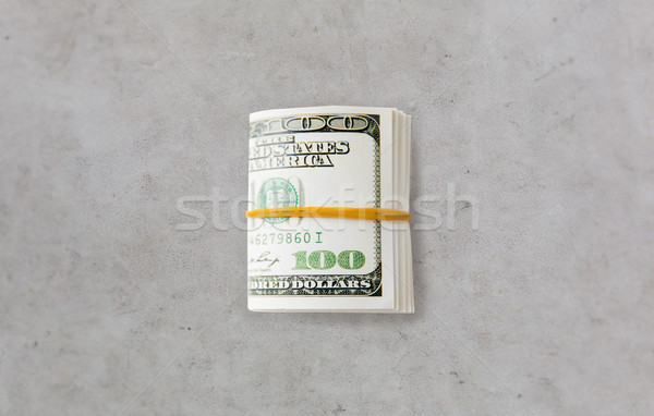 close uop of dollar money packet tied with rubber Stock photo © dolgachov