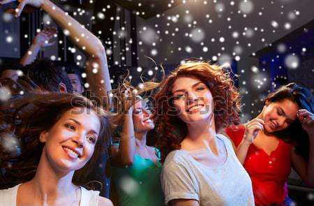 Boldog fiatal nők fények buli ünnepek új év Stock fotó © dolgachov