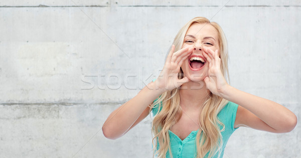 young woman or teenage girl shouting Stock photo © dolgachov