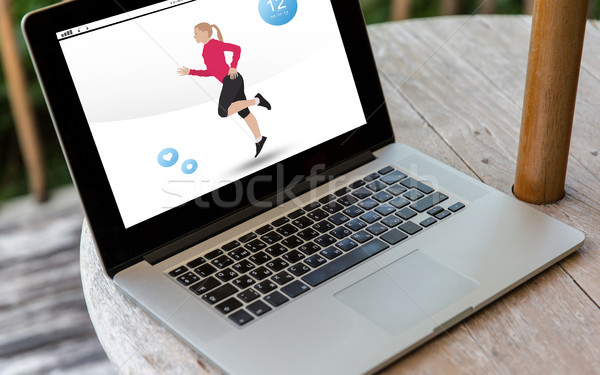close up of laptop computer with fitness app Stock photo © dolgachov