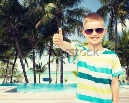 微笑的女人 日光浴 海灘 暑假 旅遊 商業照片 © dolgachov