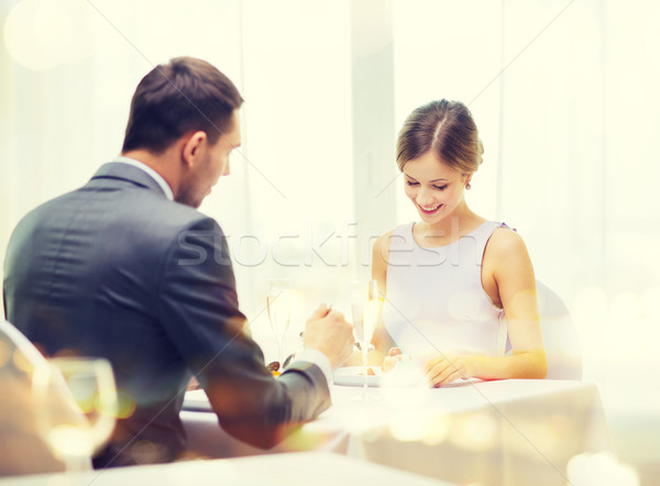 Souriant couple manger dessert restaurant vacances [[stock_photo]] © dolgachov