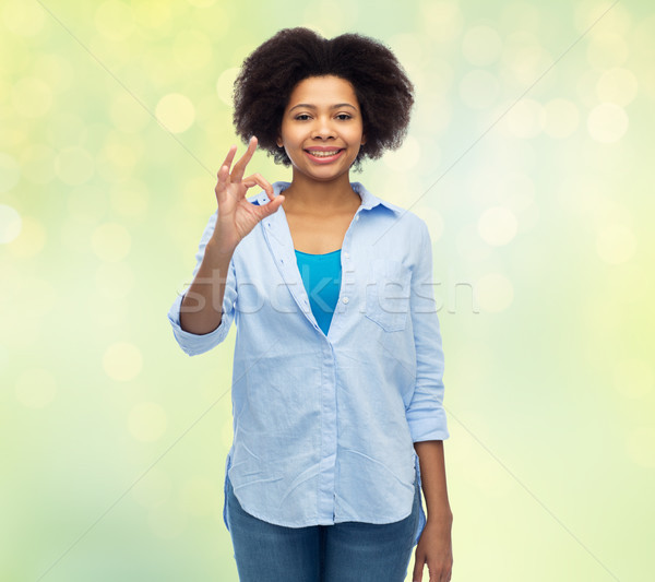 Stockfoto: Gelukkig · afro-amerikaanse · vrouw · tonen · handteken