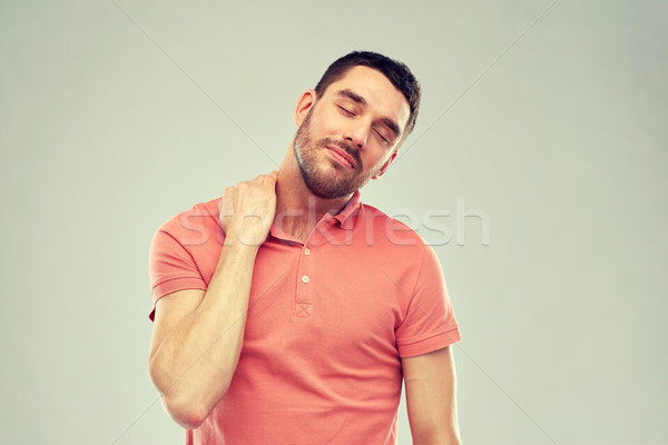 Infeliz hombre sufrimiento dolor de cuello personas salud Foto stock © dolgachov