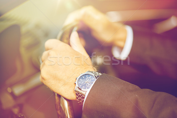 Idős üzletember kezek vezetés autó szállítás Stock fotó © dolgachov