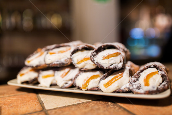 pastry on plate at bakery Stock photo © dolgachov