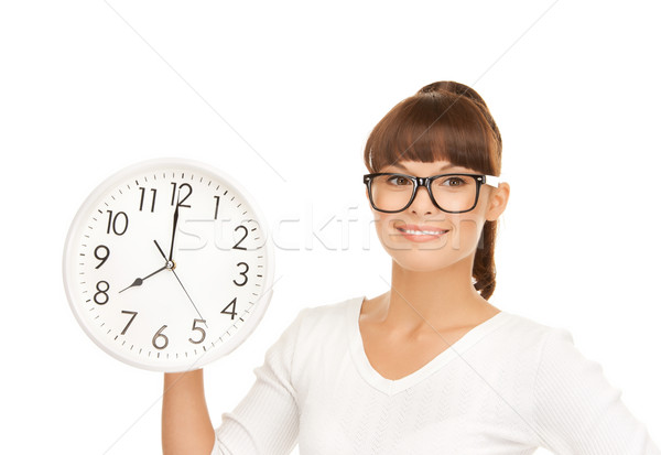 businesswoman with wall clock Stock photo © dolgachov