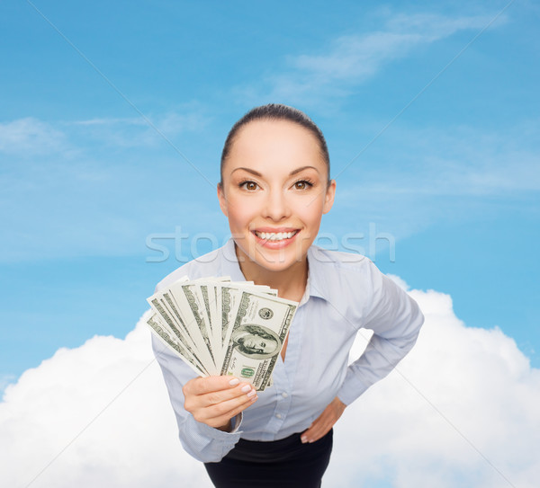 笑みを浮かべて 女性実業家 ドル 現金 お金 ビジネス ストックフォト © dolgachov