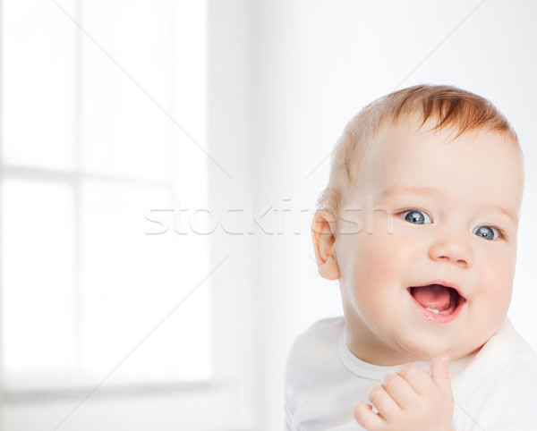 smiling little baby Stock photo © dolgachov