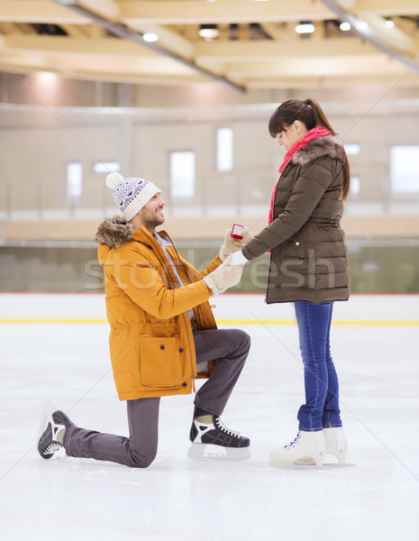 Boldog pár eljegyzési gyűrű korcsolyázás pálya emberek Stock fotó © dolgachov