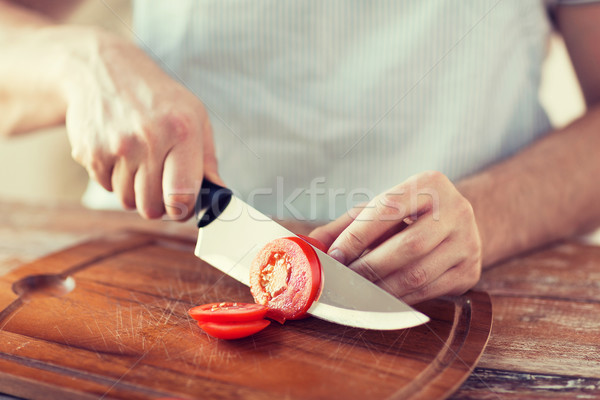 Stok fotoğraf: Erkek · el · domates · tahta · bıçak