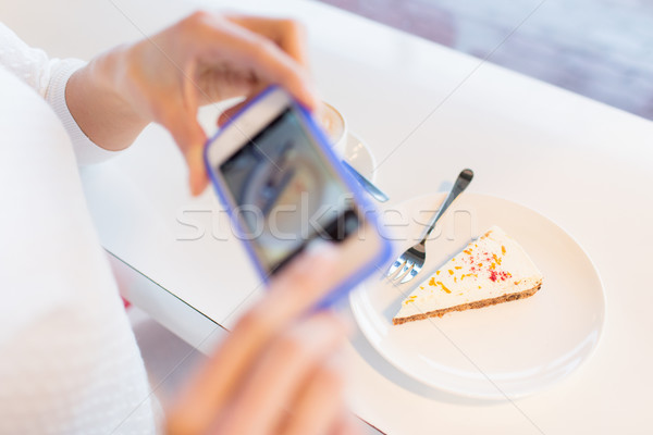 woman hands with smartphone taking food picture Stock photo © dolgachov