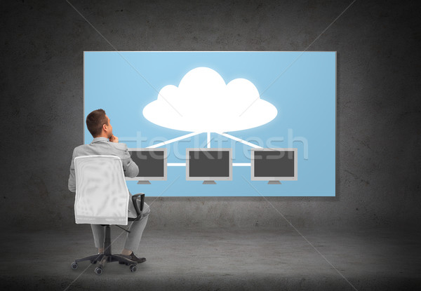 businessman in office chair over cloud server Stock photo © dolgachov
