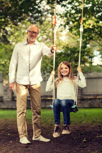 happy family in front of house outdoors Stock photo © dolgachov