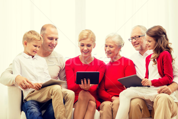 Glimlachend familie computers home vakantie Stockfoto © dolgachov