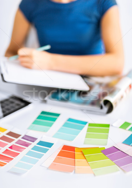 woman working with color samples for selection Stock photo © dolgachov