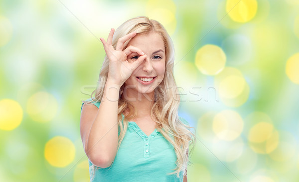 Fiatal nő készít ok kézmozdulat jókedv érzelmek Stock fotó © dolgachov