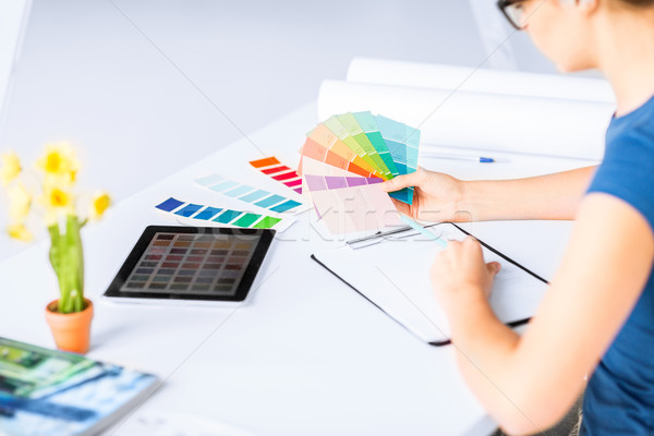 woman working with color samples for selection Stock photo © dolgachov