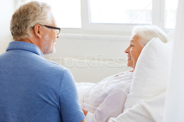 senior couple meeting at hospital ward Stock photo © dolgachov