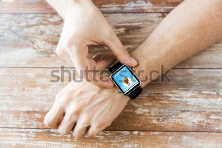 Handen muziekspeler smart horloge business Stockfoto © dolgachov